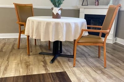 Interior common area with a round table and chairs
