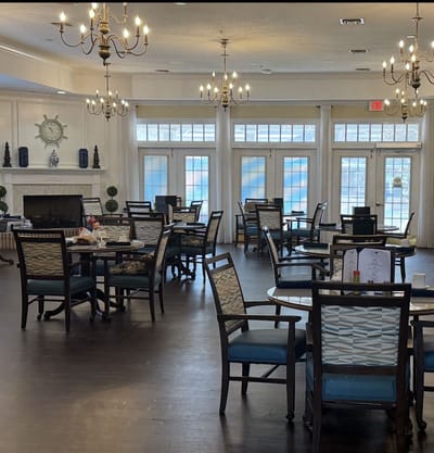 Dining area with tables and chandeliers