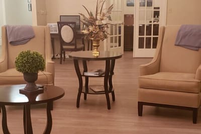 Cozy common area with chairs and decorative arrangements