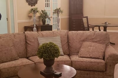 Cozy common area with a sofa and table