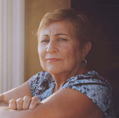 Tranquility of Cartersville, nursing home in Cartersville, GA — Senior woman with short hair looking thoughtfully at the camera