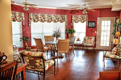 Bright common area with floral decor and seating