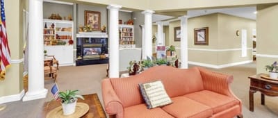 Interior common area with seating and bookshelves