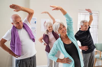 Residents participating in a group exercise class