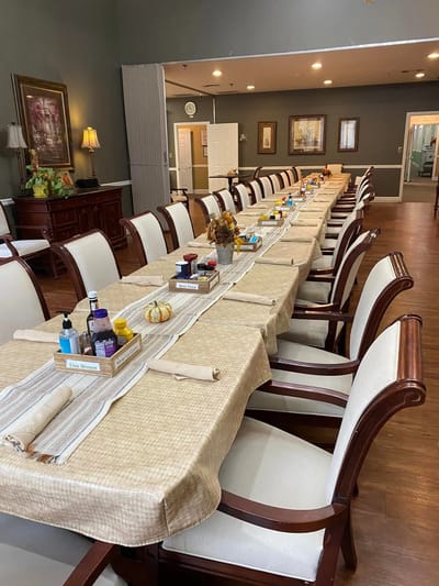 Dining area set up for a meal with decorative touches