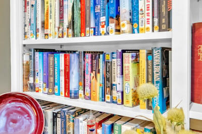 Bookshelf filled with various book titles
