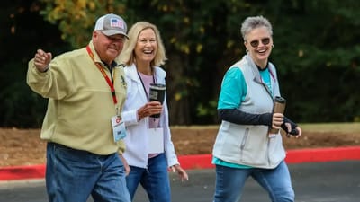 Residents and staff enjoying a walk outdoors