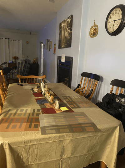 Interior view of a common area with a table and chairs