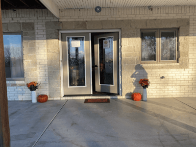 Entrance to Rainbow Senior Care Home with seasonal decorations
