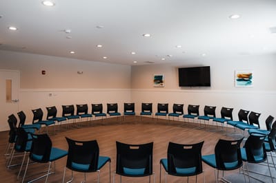 Interior meeting room with circular seating arrangement