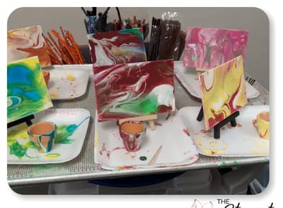 Colorful abstract paintings on display for a creative activity