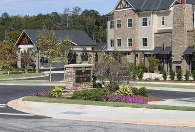 Exterior view of River Birch Place with landscaped entrance