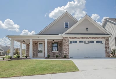 Exterior view of a residential building with landscaping