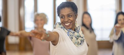 Participants enjoying a group exercise class indoors