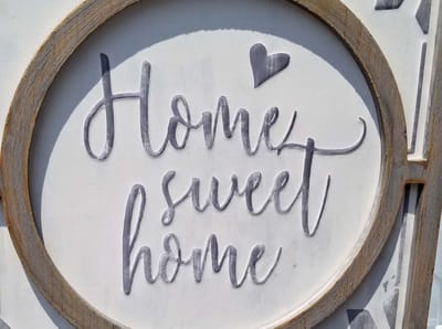 Decorative sign with 'Home sweet home' text