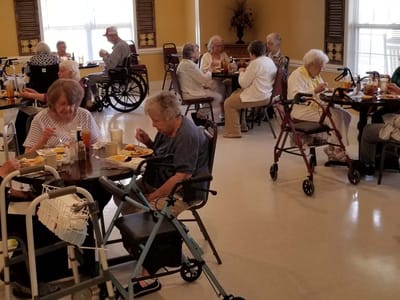 Residents enjoying meals in the dining room