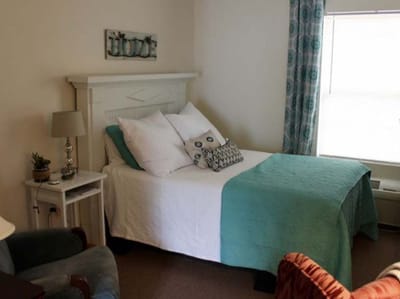 Cozy private room with a bed and decor