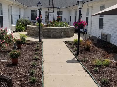 A well-maintained outdoor garden space with walking paths