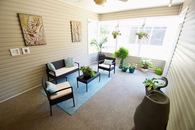 Comfortable lounge area with plants and seating