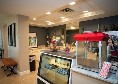 Interior view of a common area with food service appliances