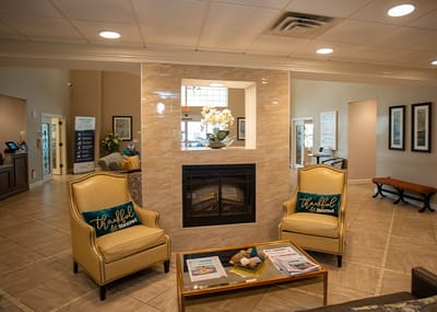 Interior common area with seating and fireplace