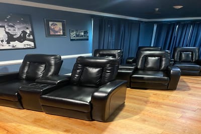 Cozy common area with leather recliners
