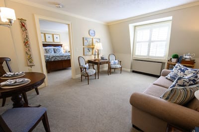 Cozy interior of a resident's room with seating area