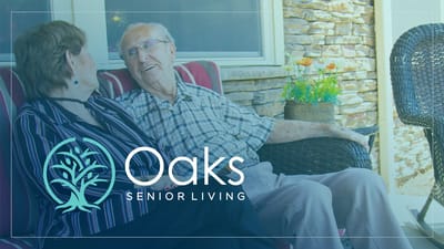 Logo of Oaks Senior Living with two residents