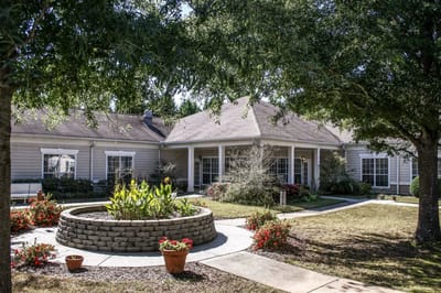 Exterior view of the facility surrounded by landscaping