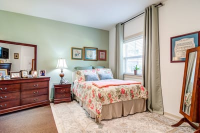 Cozy private resident room with floral decor