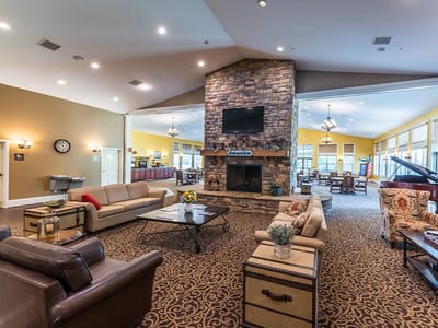 Common area with seating and a fireplace