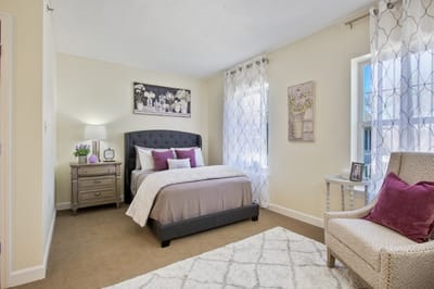 A cozy resident bedroom with decorative touches
