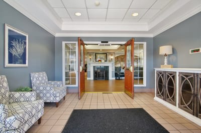 Interior lobby with seating and fireplace