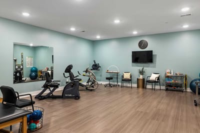 Interior fitness room with exercise equipment