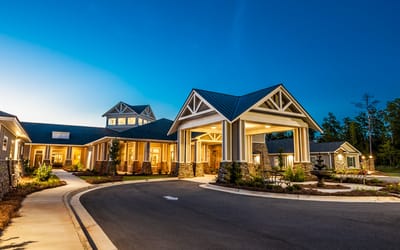 Exterior view of the Fellowship Hillside facility at dusk