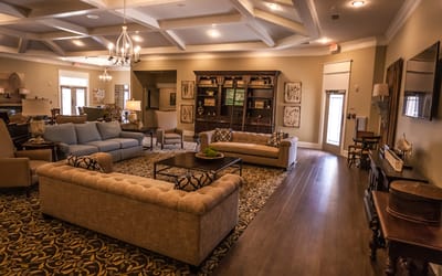 Bright common area with sofas and decor