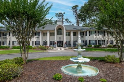Exterior view of the facility with a fountain.