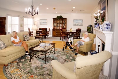 Residents enjoying time in a cozy common area