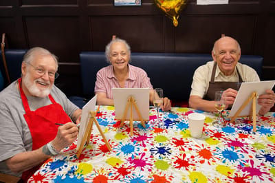 Residents enjoying an art activity together