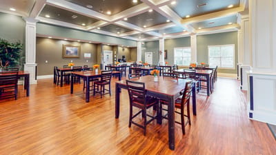 Dining area with wooden tables and vibrant decor