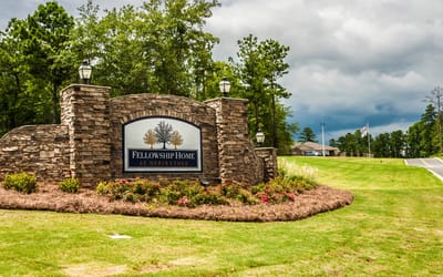 Welcome sign at the entrance of Fellowship Home