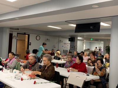 Residents engaged in a group activity in a common area