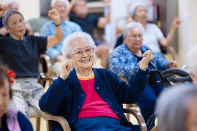 Residents enjoying an engaging activity in a common area