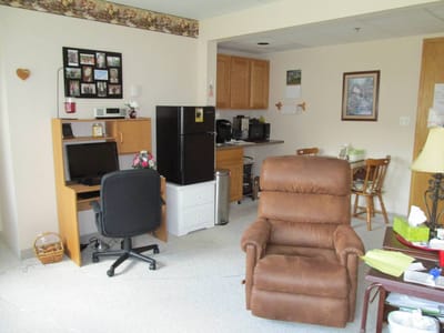 Cozy interior of a resident room with kitchen area