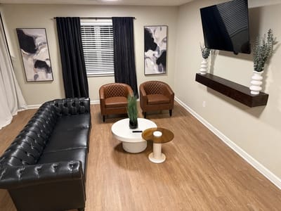 Bright common area with stylish seating and decor