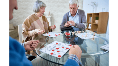 Residents engaging in a bingo game in a common area