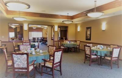 Dining room with tables set for meals