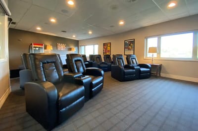 Interior of a comfortable common area with recliners