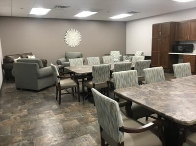 Bright and spacious dining area with tables and seating
