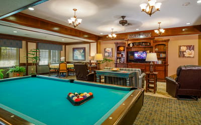 Common area with a pool table and seating